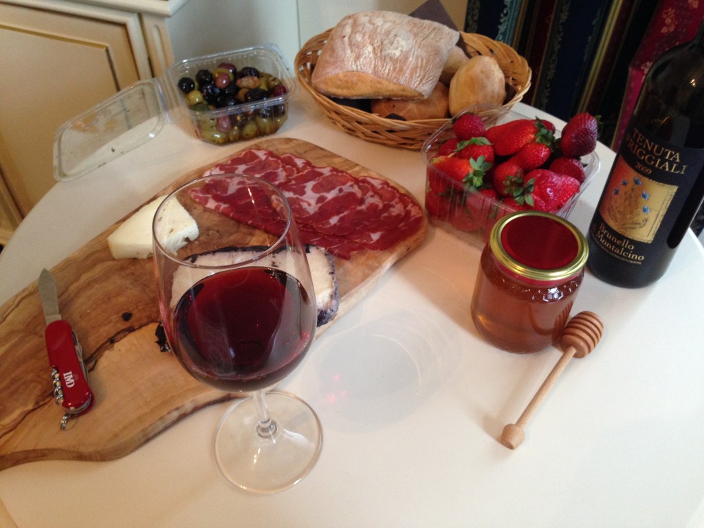 All from the Cannobio Market: breads, "crudos", fresh strawberries, olives, honey and wine! 